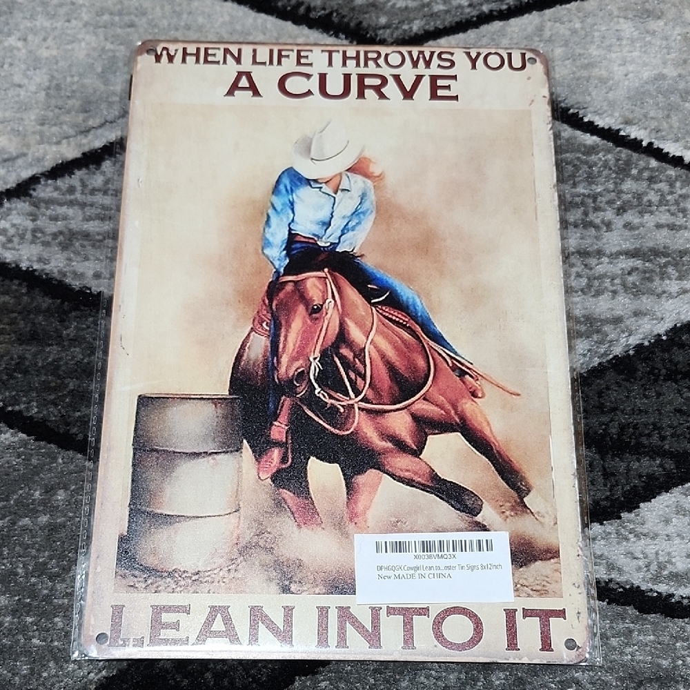 COWGIRL "WHEN LIFE THROWS YOU A CURVE LEAN INTO IT" METAL TIN WALL SIGN 8"X12"